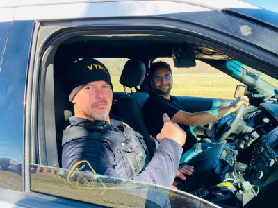 Student police academy: student driver with VTPD officer in passenger seat